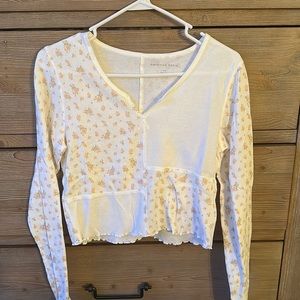 White and Floral. American Eagle v-neck long sleeve